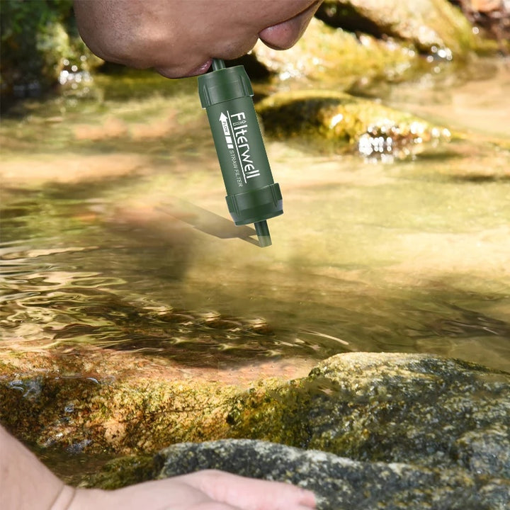 Water filter straw used at a stream