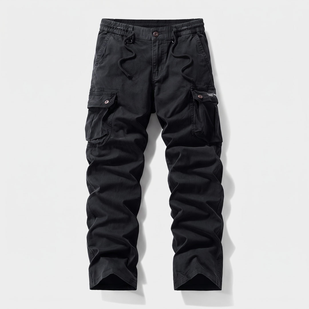 Men's cotton cargo pants in black, front view, elastic drawcord waist with button and zip fly
