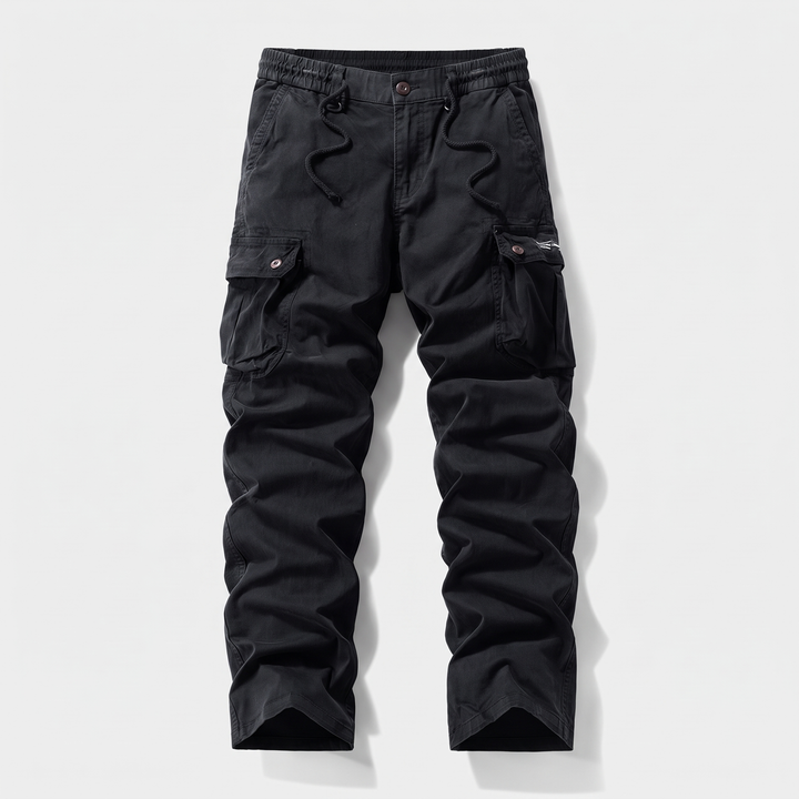 Men's cotton cargo pants in black, front view, elastic drawcord waist with button and zip fly