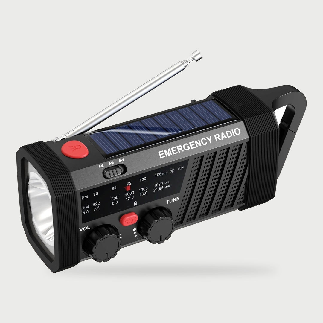 Black crank radio with AM FM shortwave tuner, solar panel, flashlight and hook handle