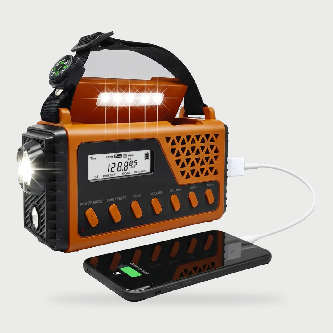 Shortwave emergency radio in Orange charging a phone over USB