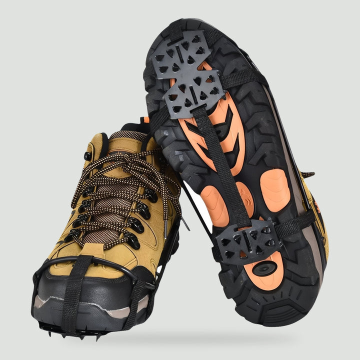 24 spike crampons fitted on a pair of hiking boots