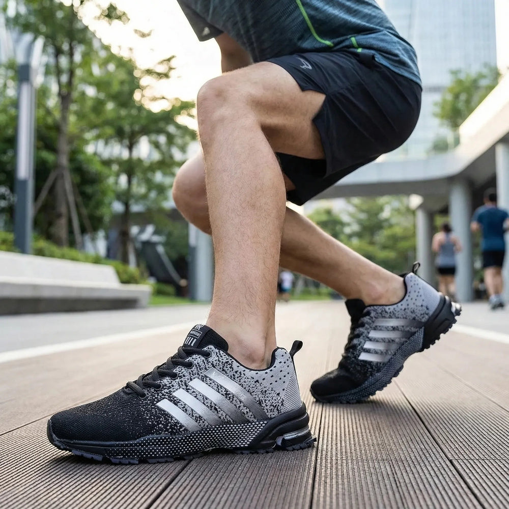 Man wearing the running shoes in Gray on a city run