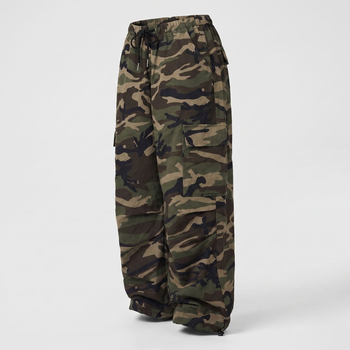 Women's baggy camo cargo pants, side view showing the thigh cargo pocket