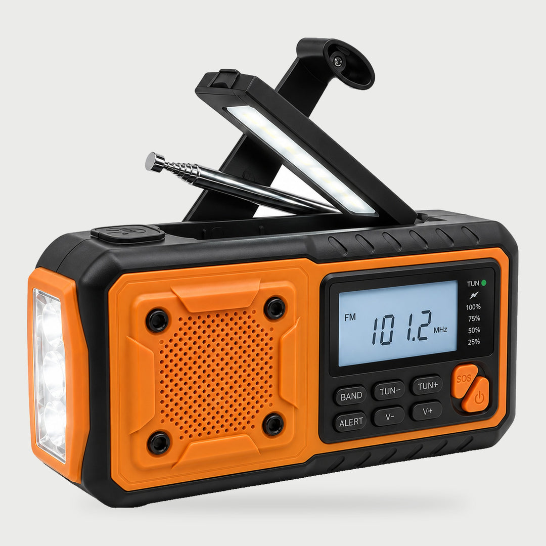 AM FM solar hand crank emergency radio in Orange with the reading light raised