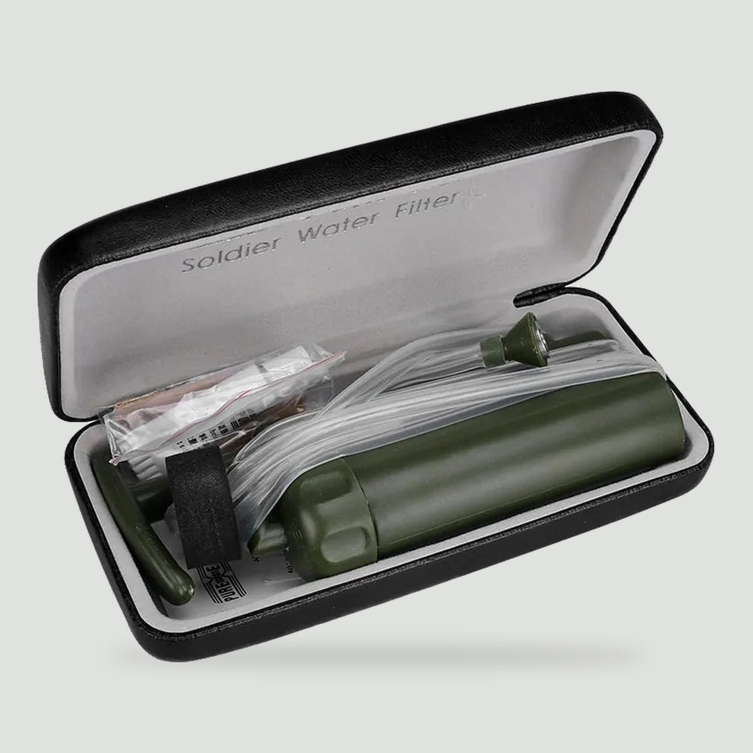 Portable water filter with hand pump and hoses in its hard carry case