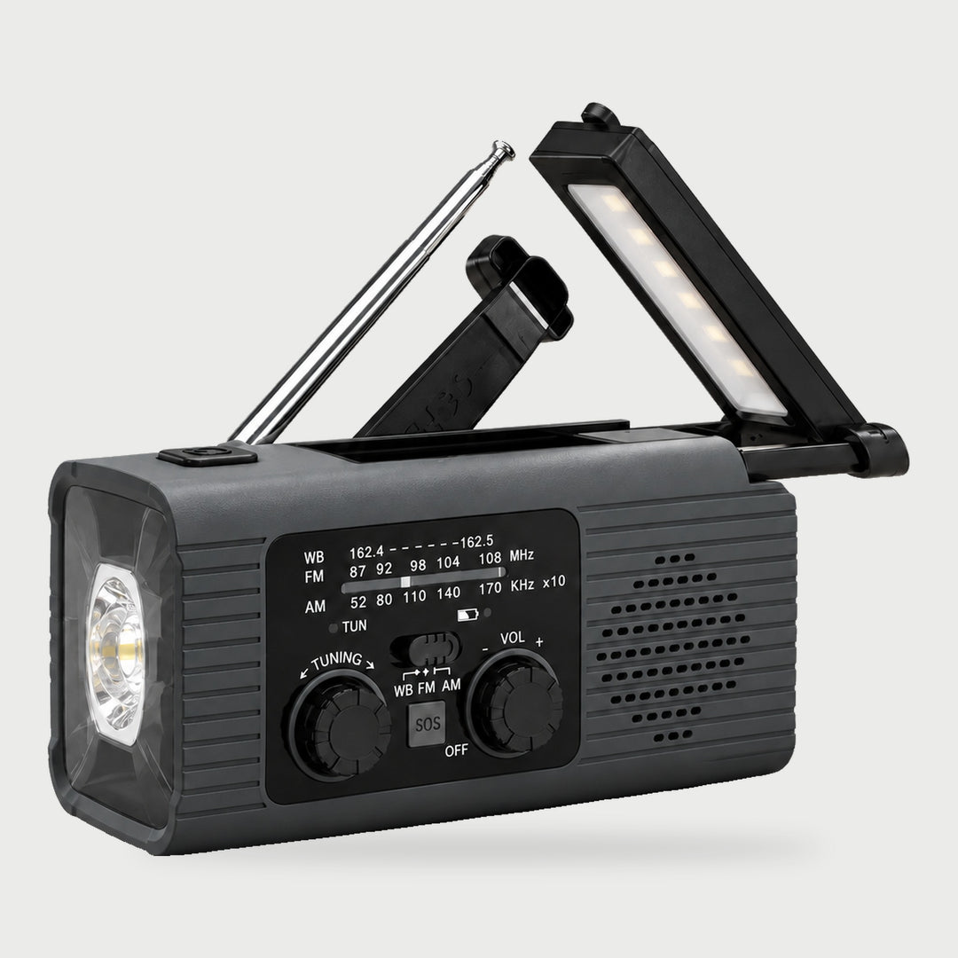 Gray weather radio with NOAA weather band, hand crank, fold-up reading lamp and flashlight