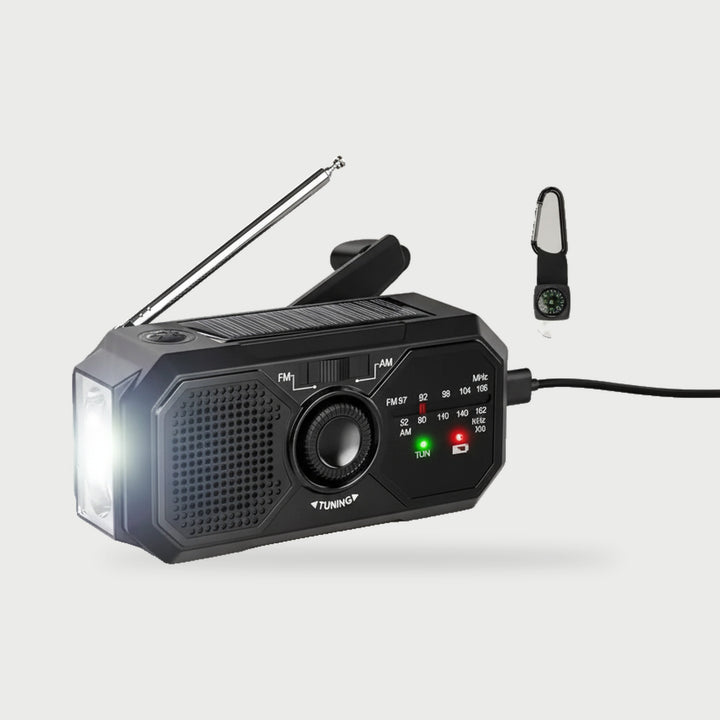 Black pocket radio with solar panel, hand crank, tuning dial and front flashlight