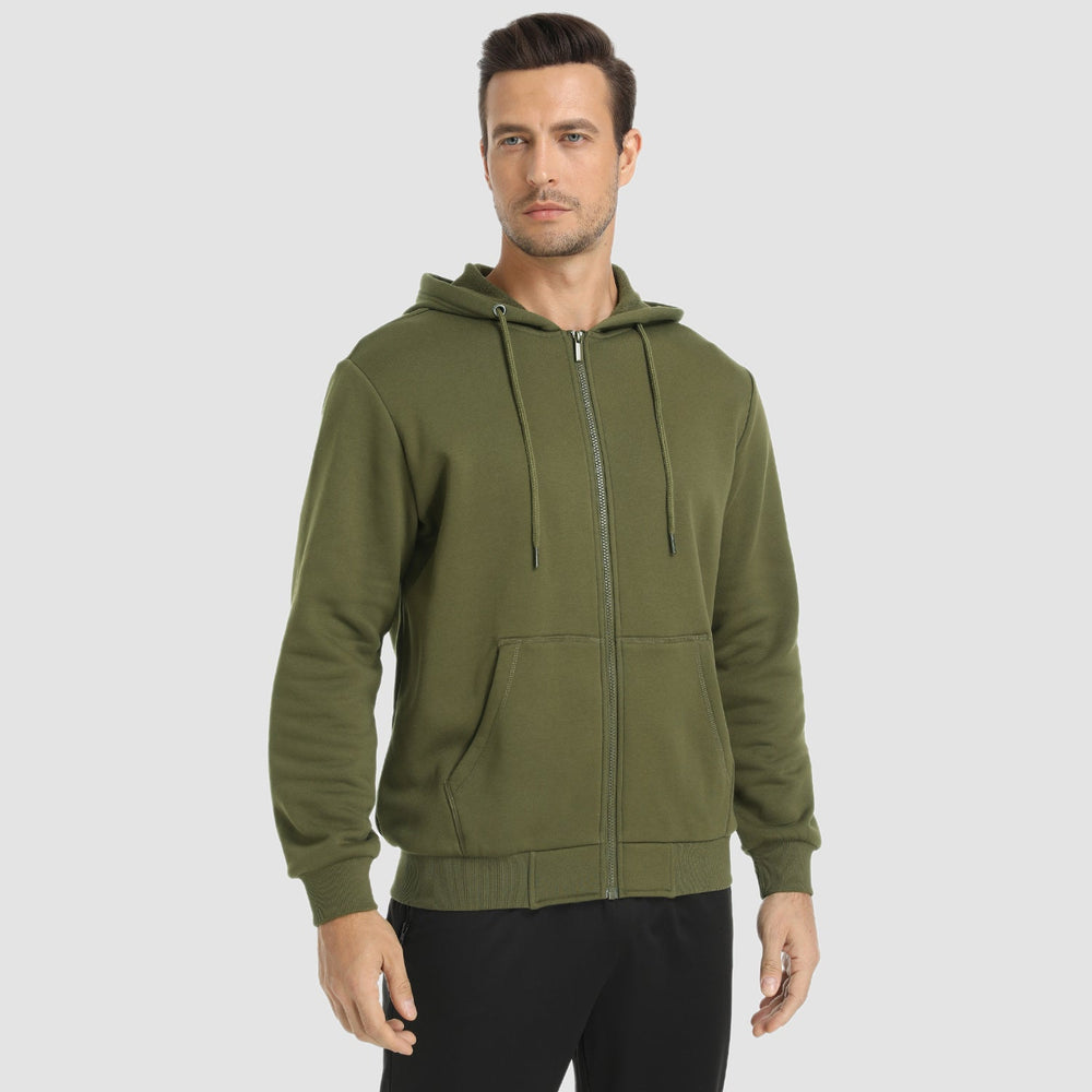 Man wearing the men's zip up hoodie in Army Green