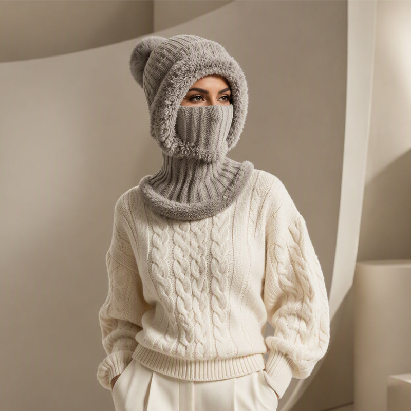 Woman wearing the knit balaclava hood with the face mask pulled up