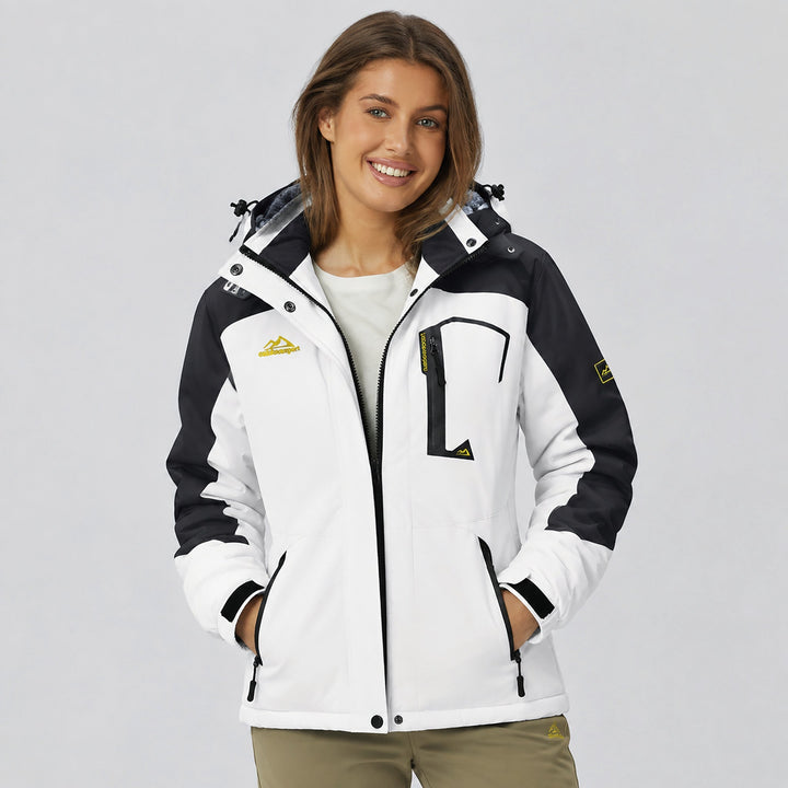 Woman wearing the women's winter jacket in White Black