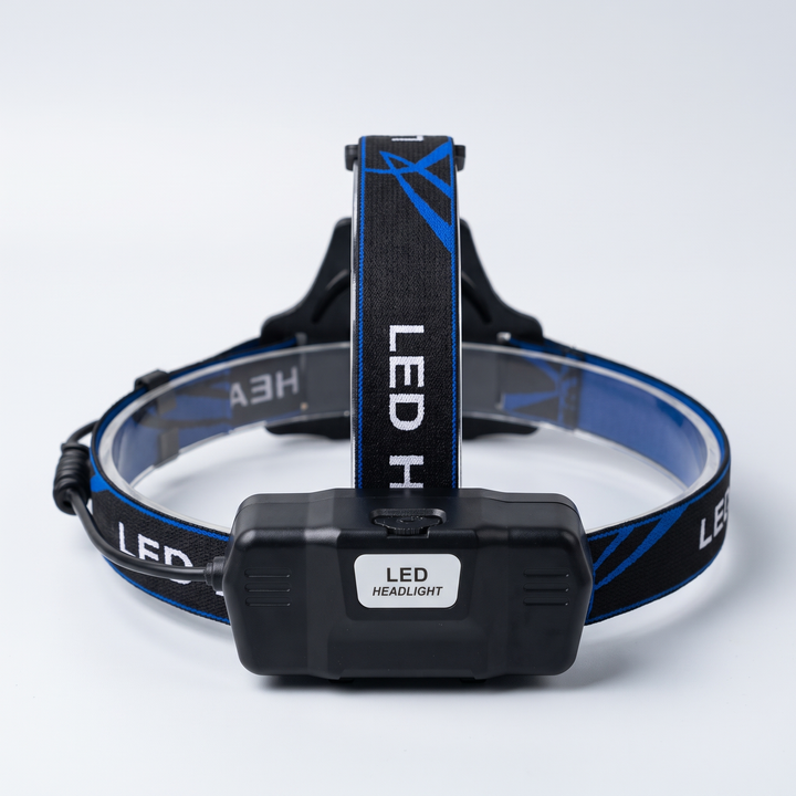Back of the headlamp with the rear battery box and over-the-top strap