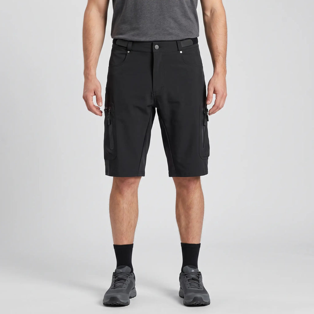 Black MTB shorts worn, front view with zipped thigh pockets