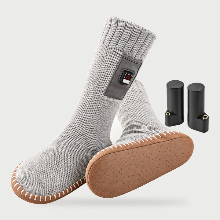 Rechargeable heated slipper socks in light gray with non-slip sole and two batteries