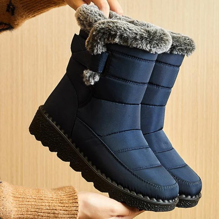 Women's fur lined boots in Blue with faux fur cuff