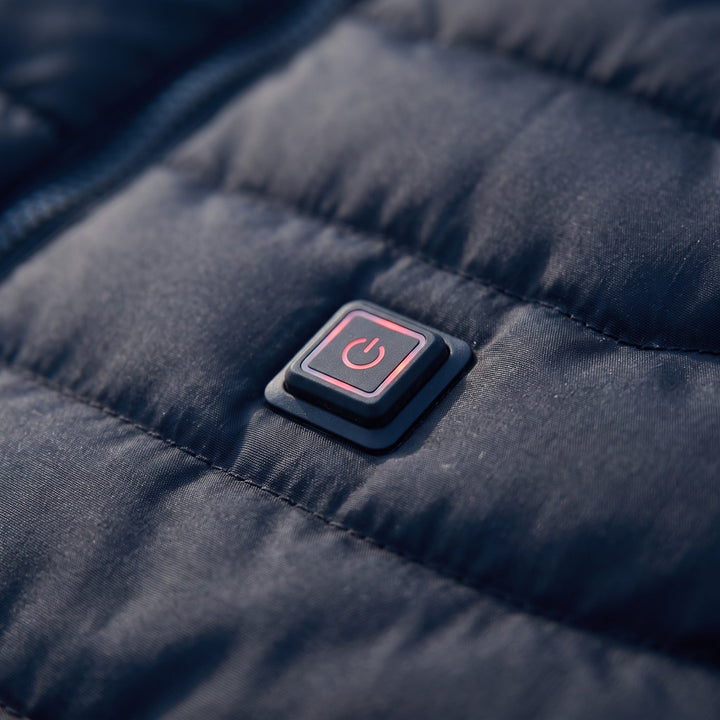 Close-up of the heat button on the chest of the heated puffer jacket