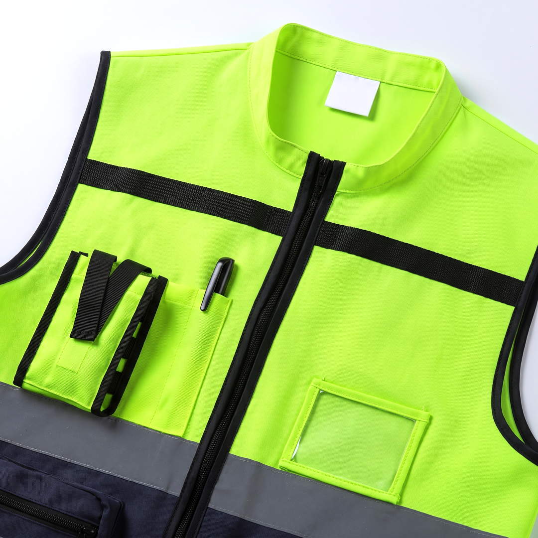 Chest pocket, pen slot and clear ID card window, close up