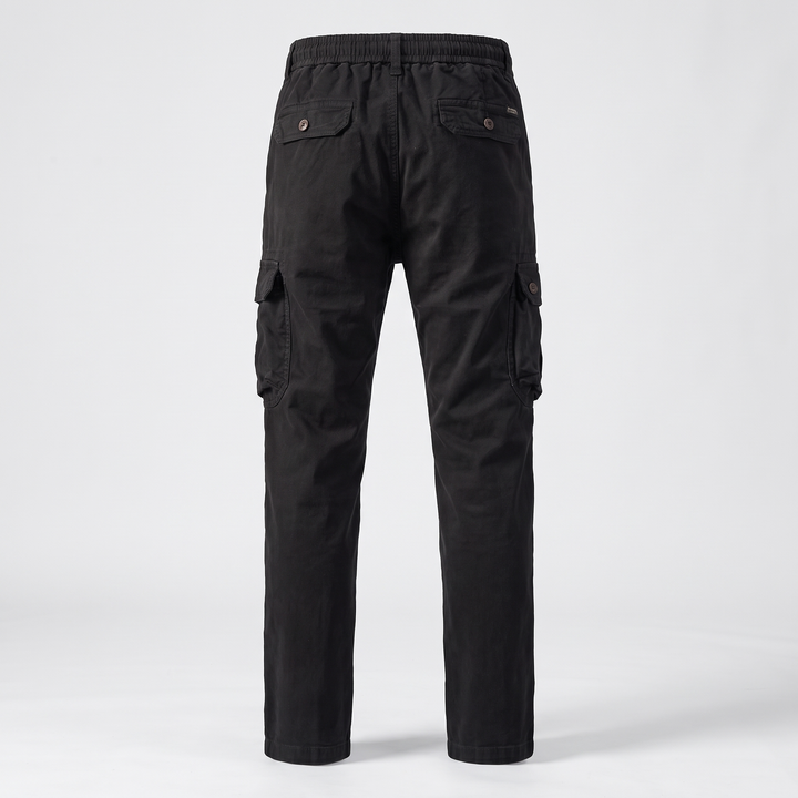 Black cotton cargo pants, back view, two back pockets with button flaps and thigh cargo pockets
