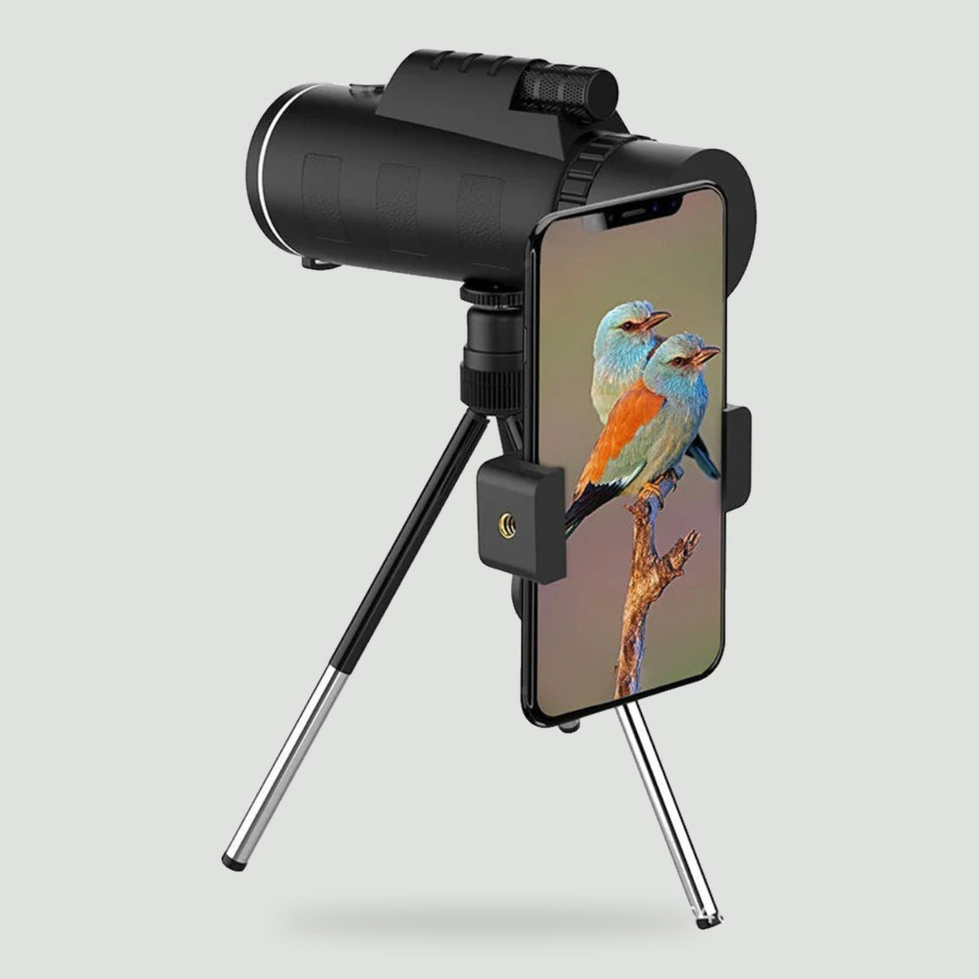 Monocular on a mini tripod with a phone in the phone clamp