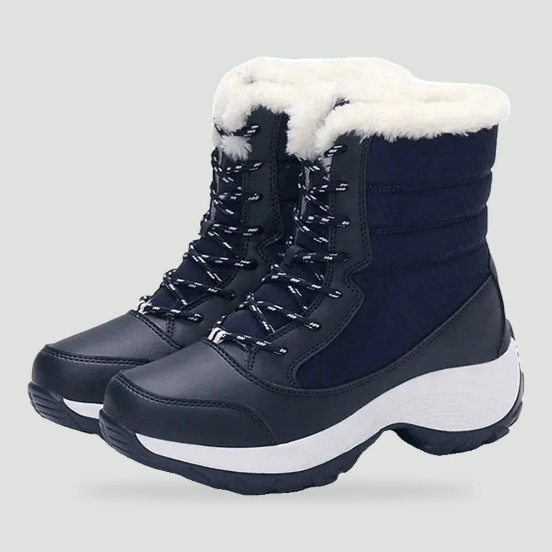 Platform winter boots for women in Navy with plush cuff, pair