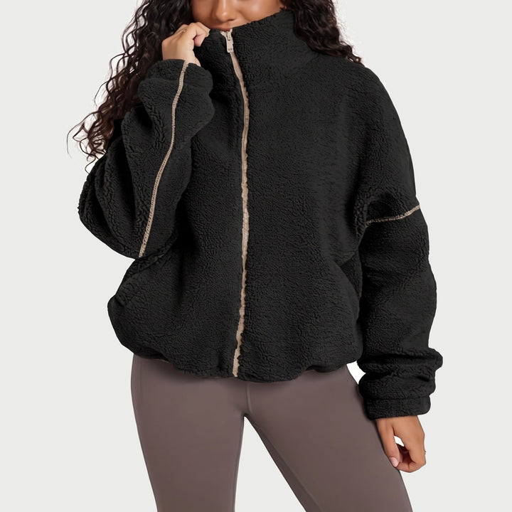 Women's sherpa fleece jacket in black with high collar