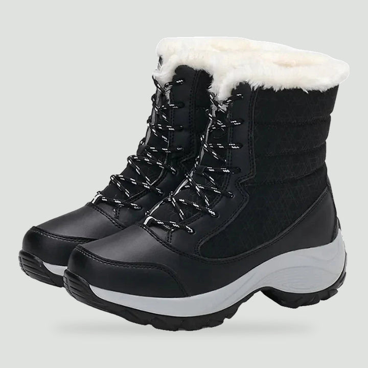 Platform winter boots for women in Black with plush cuff, pair
