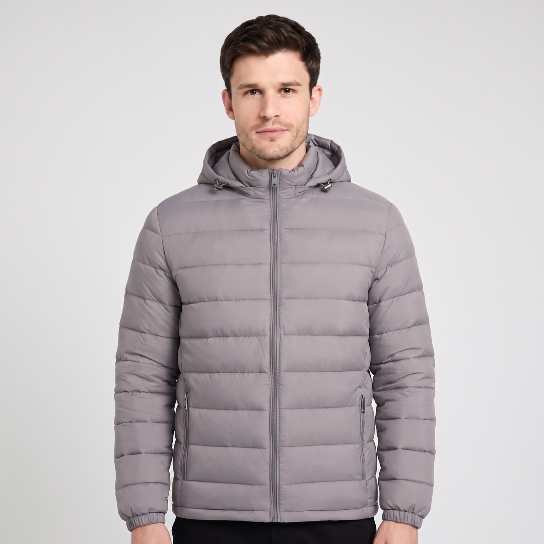Man wearing the Gray hooded puffer jacket, front