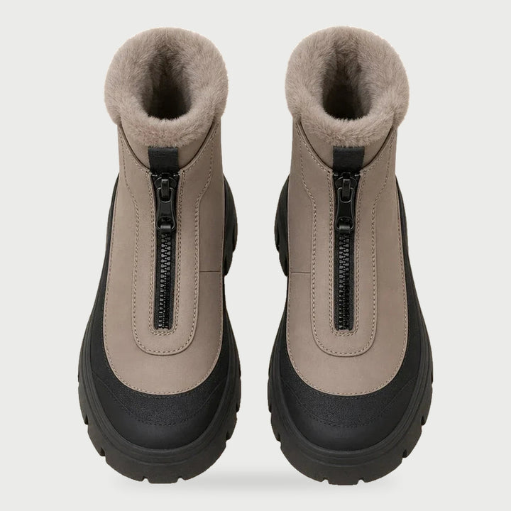 Front view of the taupe front zip snow boots with plush collar