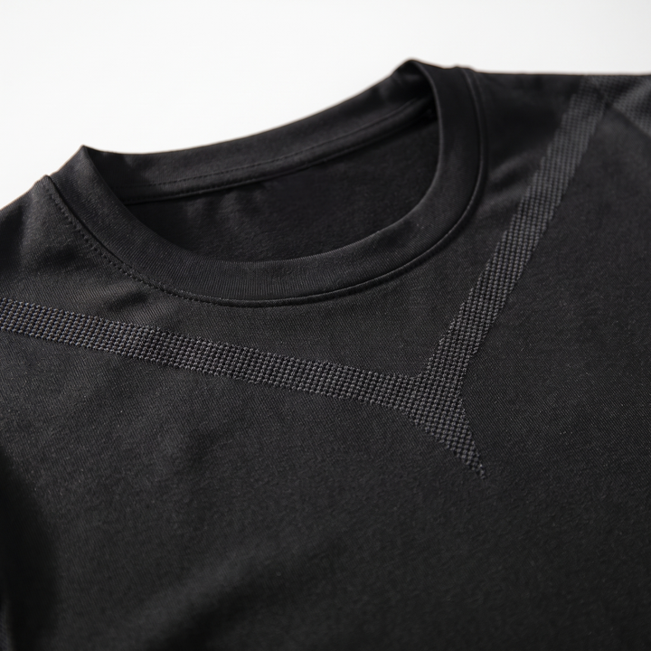 Tonal V-shaped textured knit band at the chest of the base layer top, close up