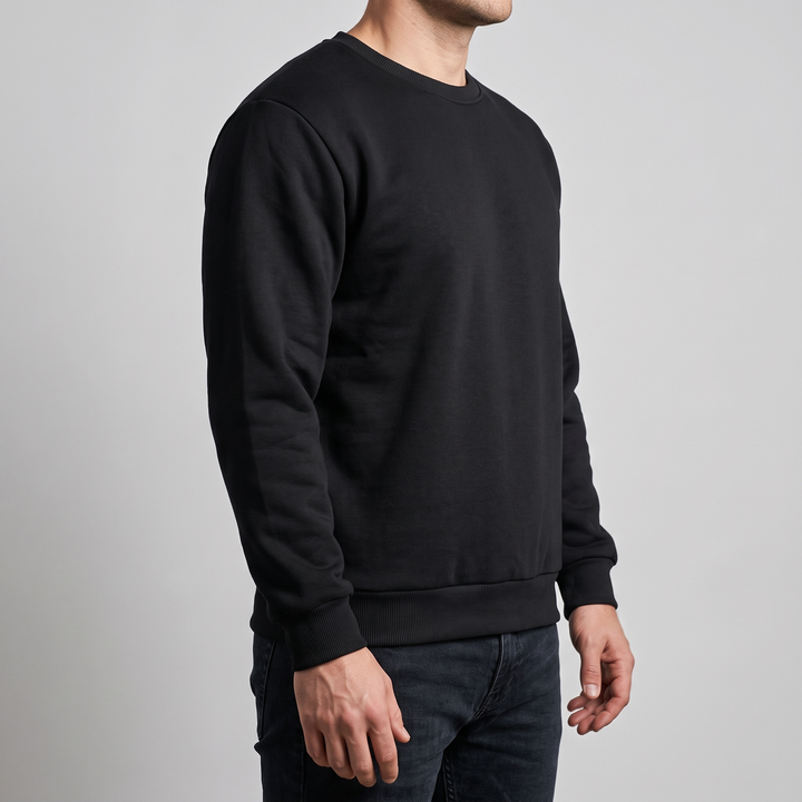 Deep ribbed hem band and ribbed cuff of the crewneck sweatshirt worn