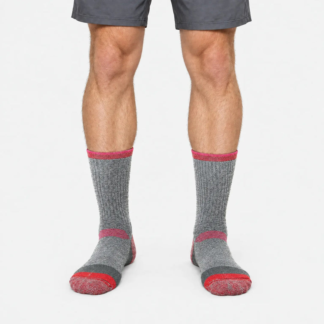 Thick wool ski socks in Gray and Red, worn, front view