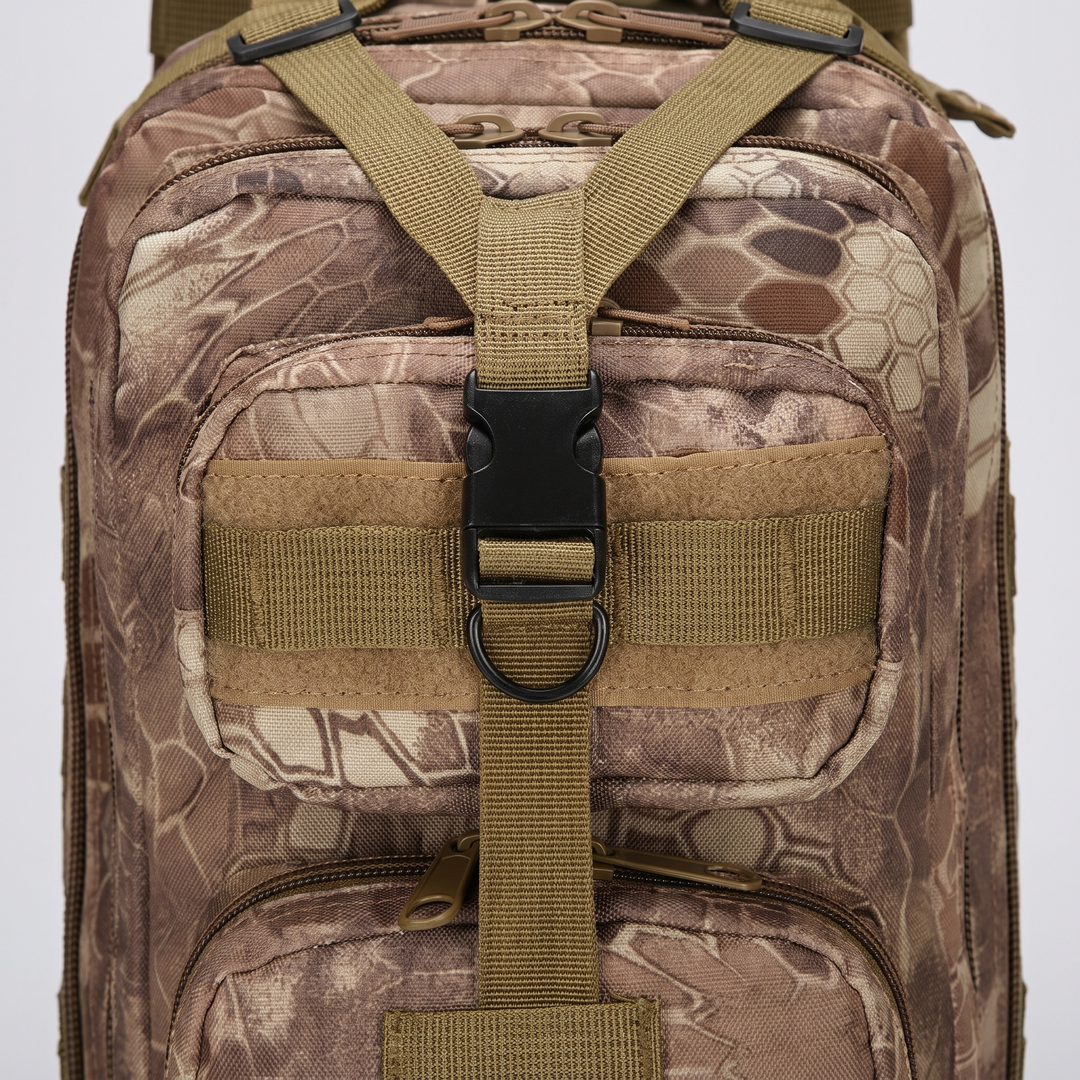 Close-up of the Y-strap pocket, buckle, D-ring and MOLLE webbing