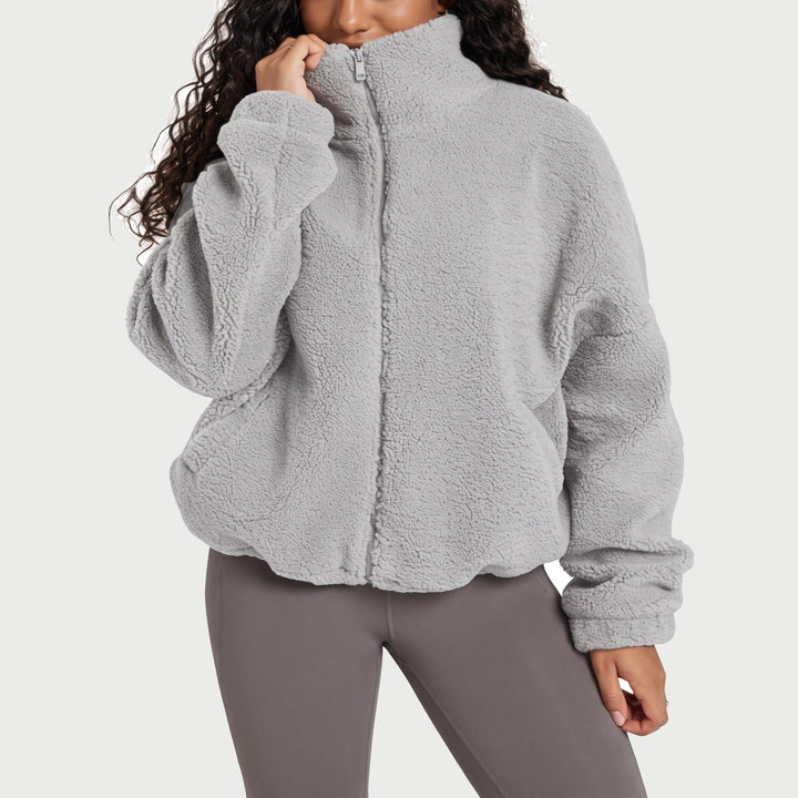 Women's sherpa fleece jacket in light gray with high collar
