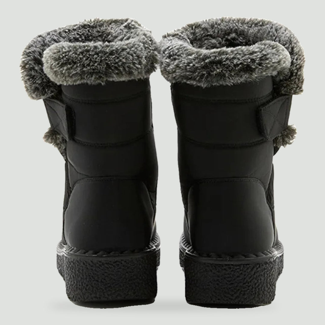 Women's fur lined boots in Black, back view