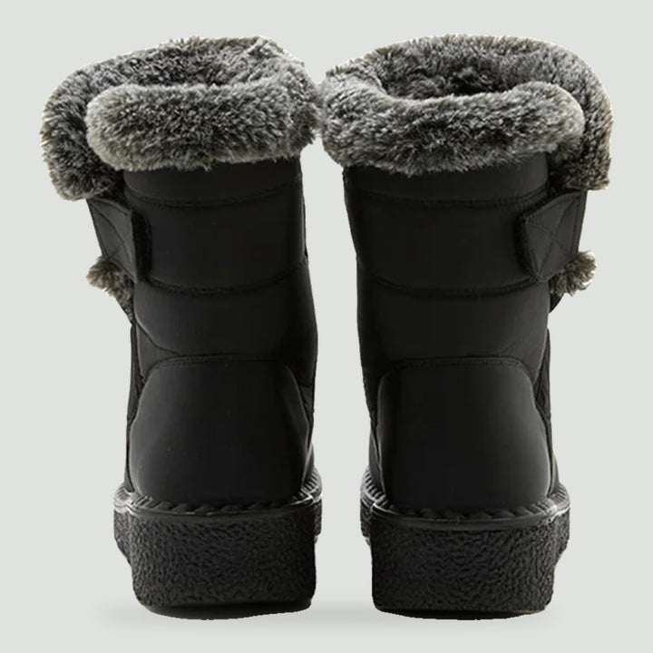 Women's fur lined boots in Black, back view