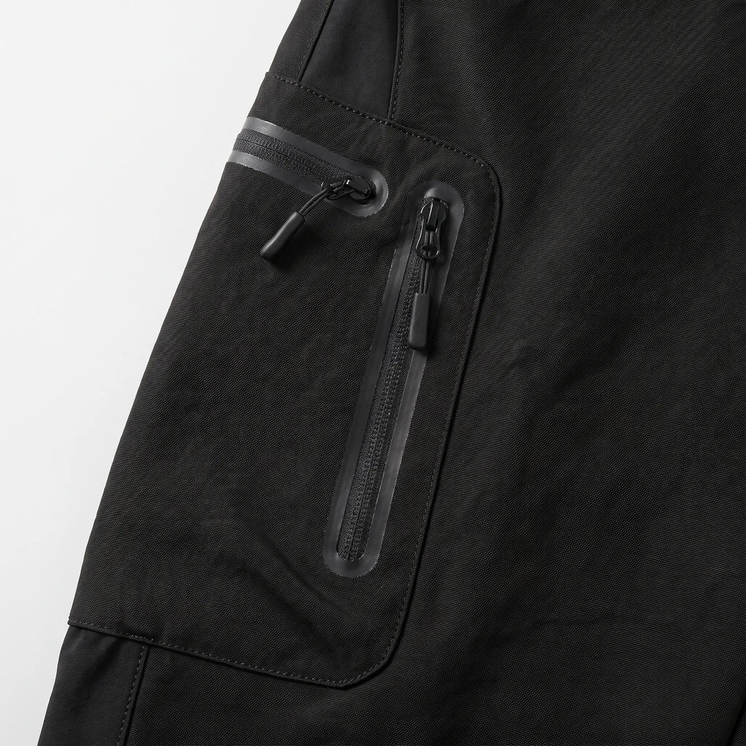 Close-up of the two coated zips on the cargo pocket