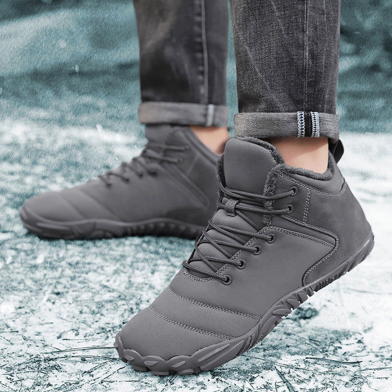 Winter barefoot shoes in gray worn in the snow