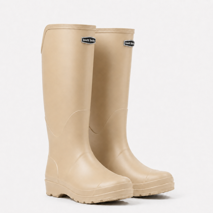Women's knee high rain boots in Beige, side view