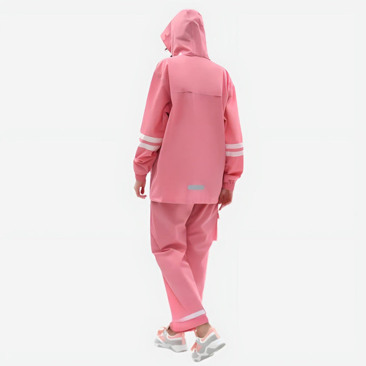 Back view of the women's rain suit in Pink with reflective stripes