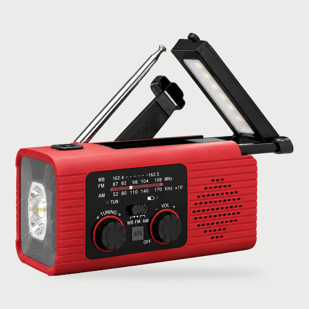 Red weather radio with NOAA weather band, hand crank, fold-up reading lamp and flashlight