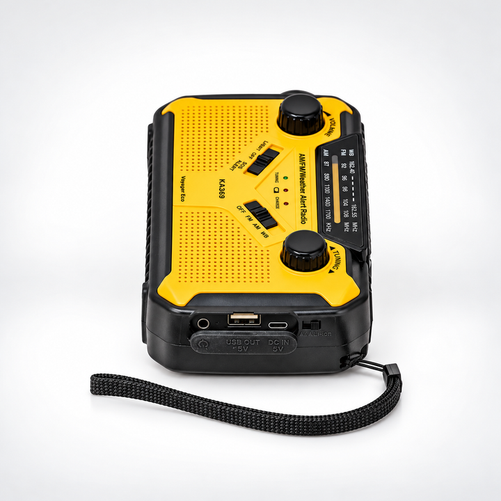 Side of the wind up radio with the charging ports and wrist strap