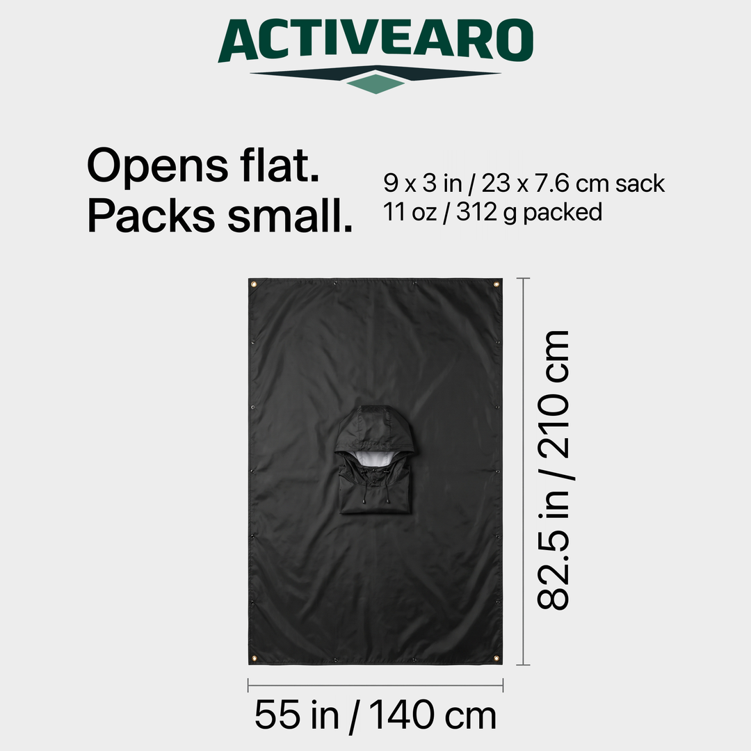 The poncho opened flat, 55 by 82.5 inches, packs into a 9 by 3 inch sack