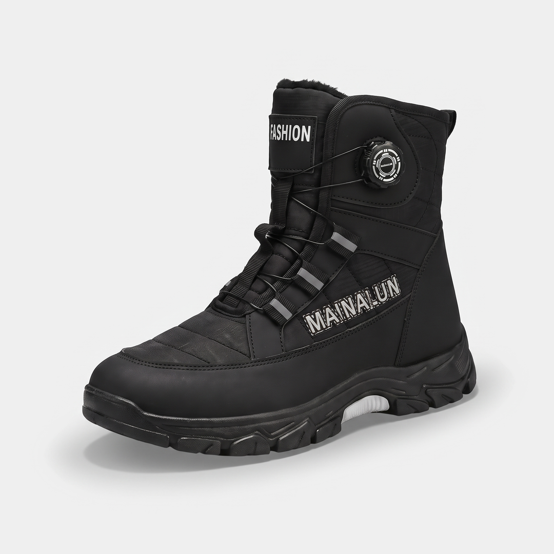 Activearo men's snow boot in black with a rotary dial on the instep, side view