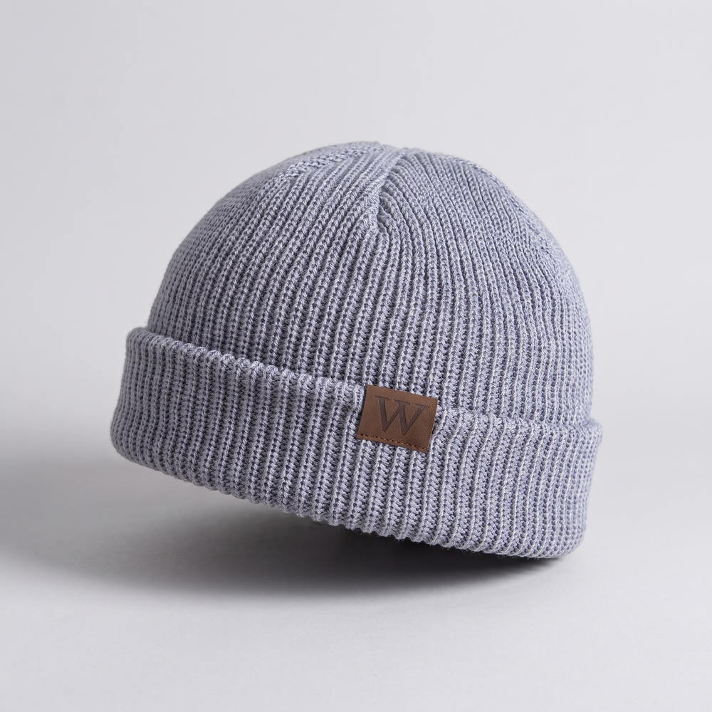 Fisherman Beanie detail - ribbed knit texture and leather patch