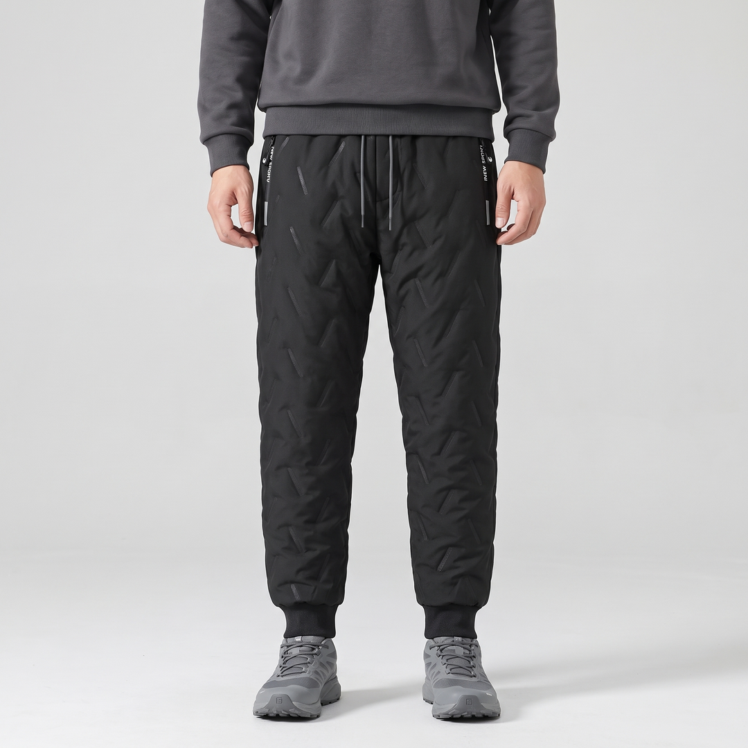 Men's sherpa lined joggers in Black worn with trail shoes, front view showing ribbed cuffs