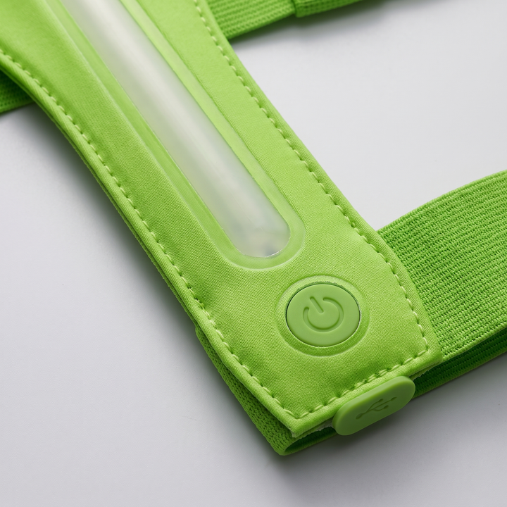 Close up of the LED strip, power button and rubber-capped USB port