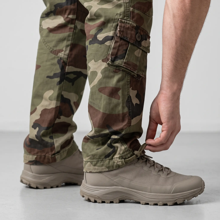 Ankle drawcord on men's camo cargo pants, close-up