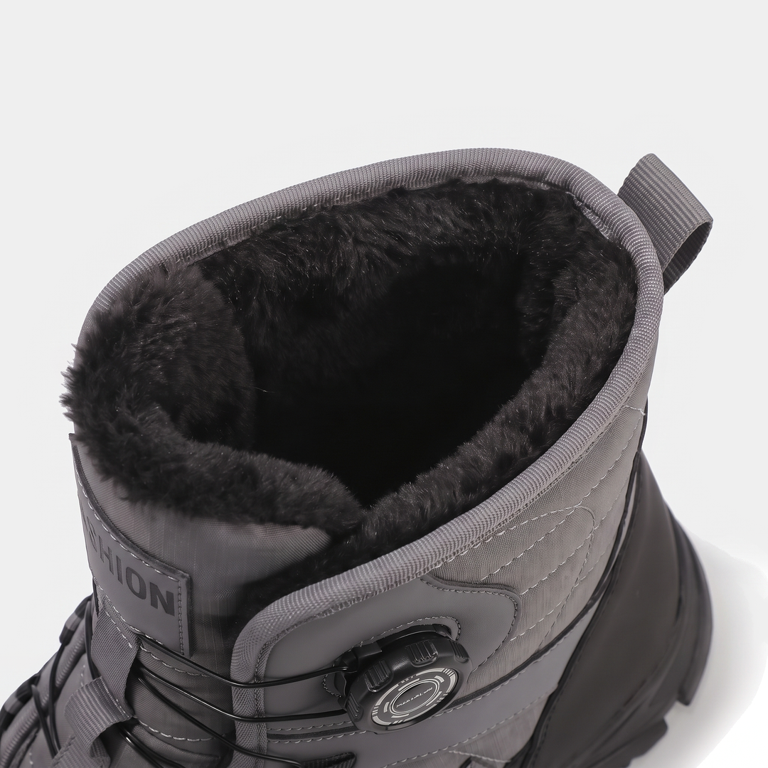 Pile lining at the collar and rear pull loop of the snow boot
