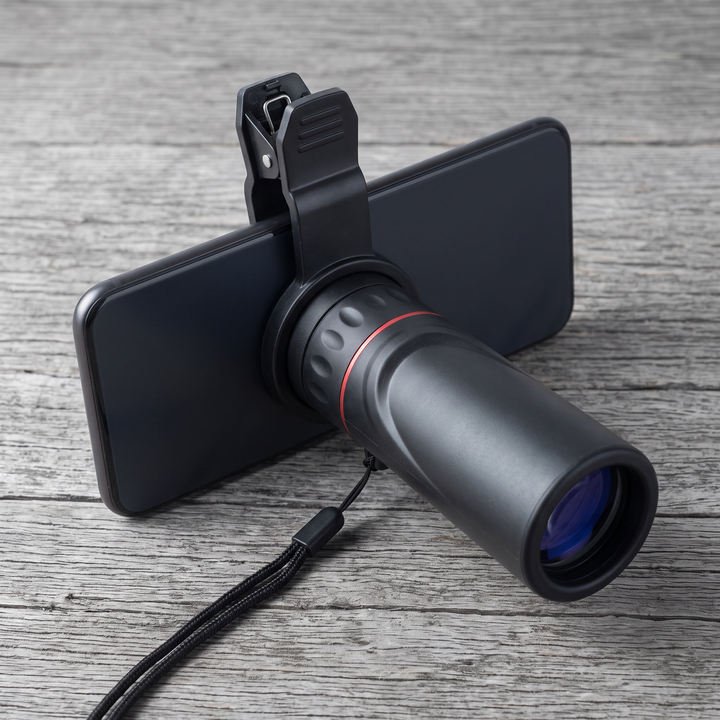 Monocular mounted over a phone camera with the spring clip