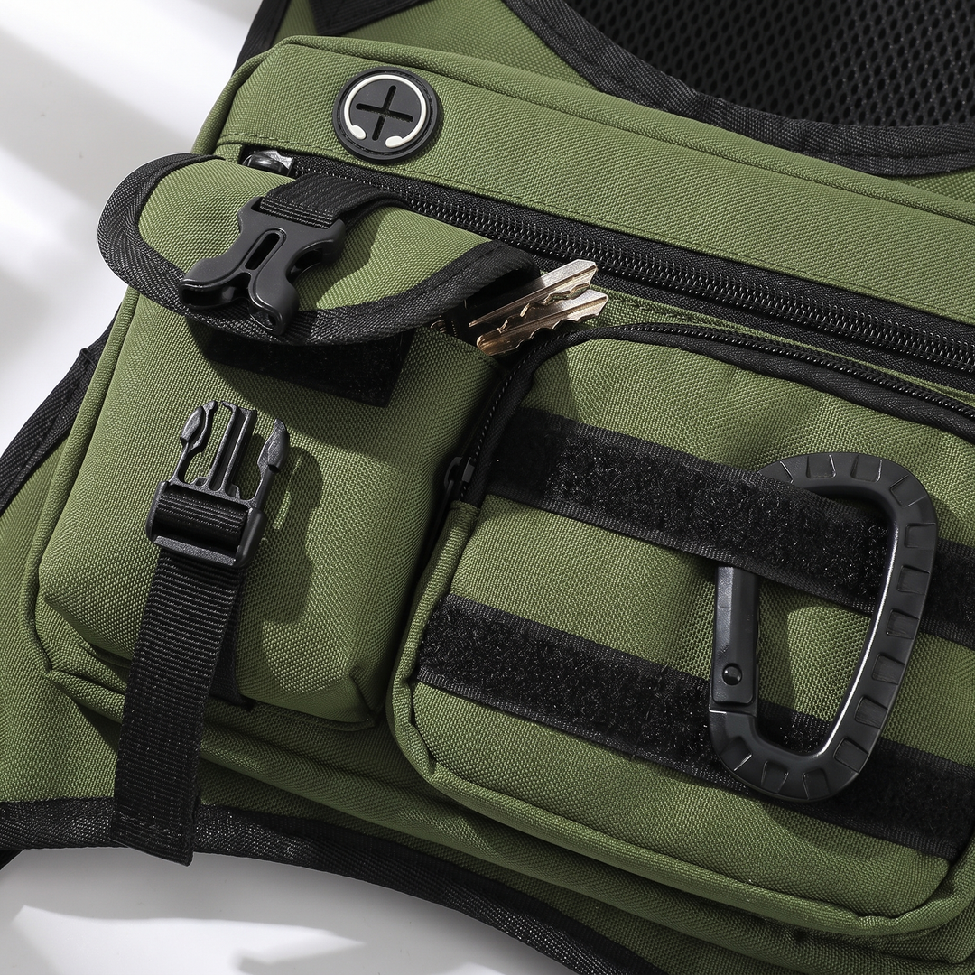 Flap pocket open beside the zip pocket and carabiner